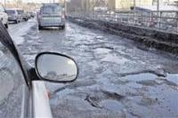 Ужасные дороги - асфальту ушел еще до прихода снега